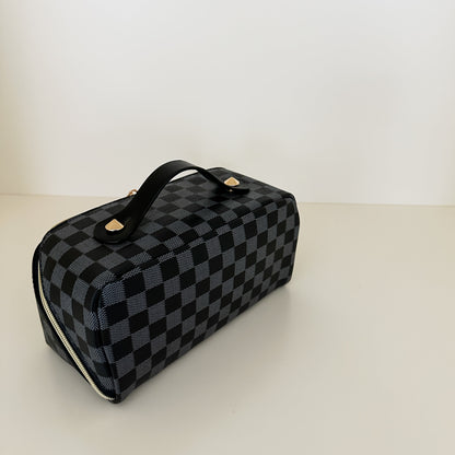 Black checkered toiletry case back view