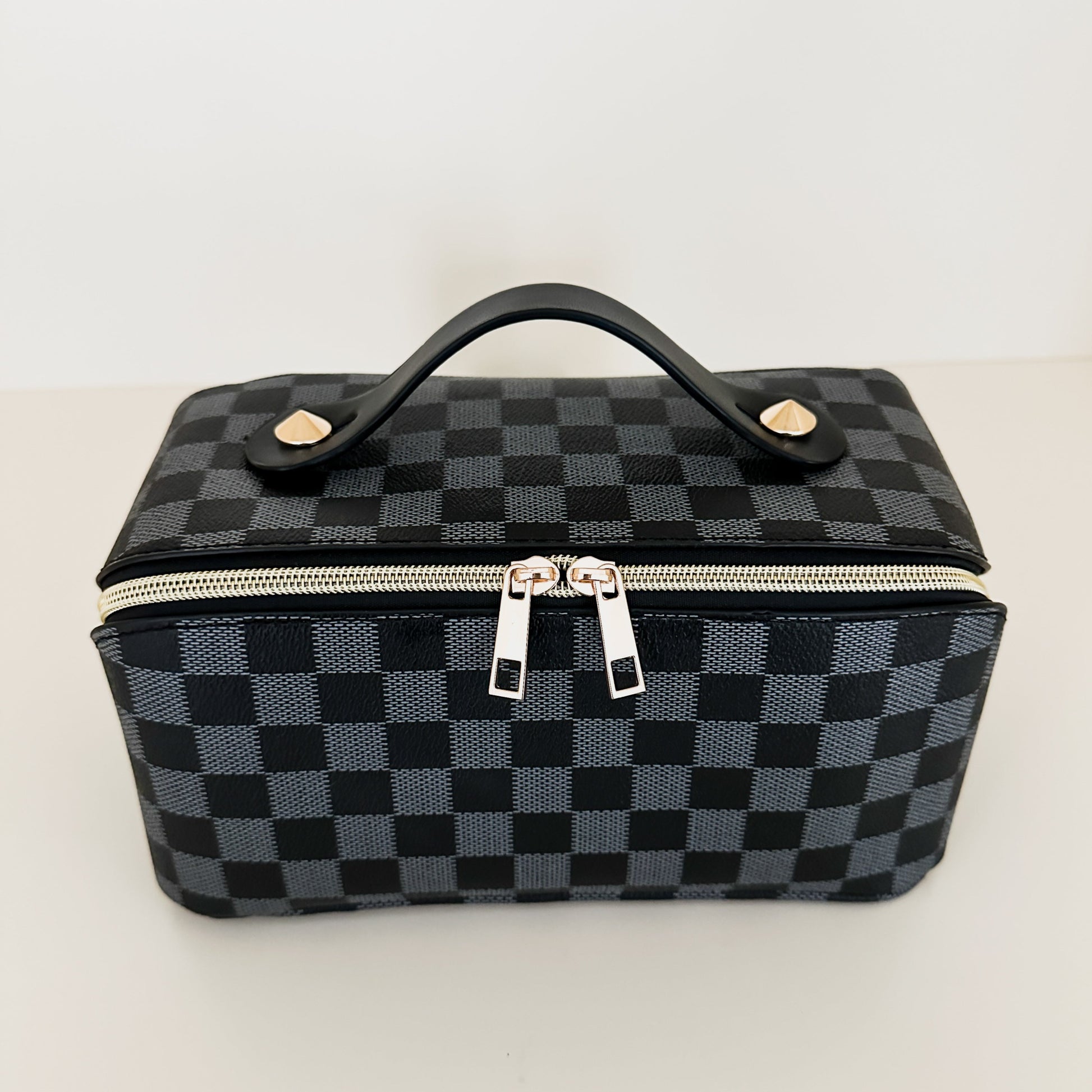 Black checkered toiletry case front view