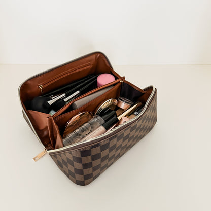 Brown checkered toiletry case holds makeup, skincare, perfume and more