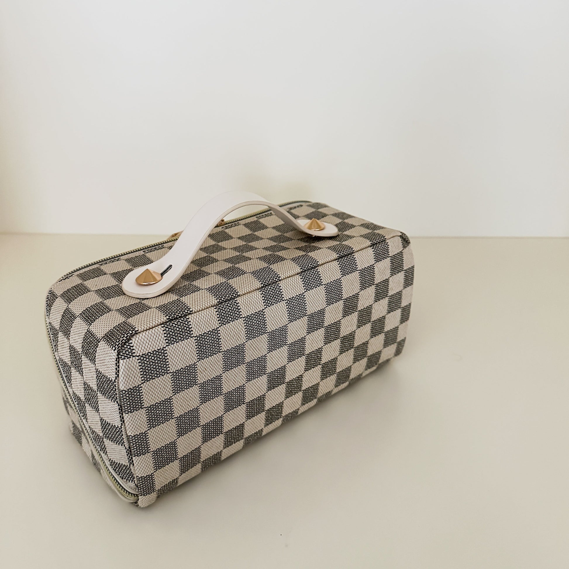 White checkered toiletry case back view