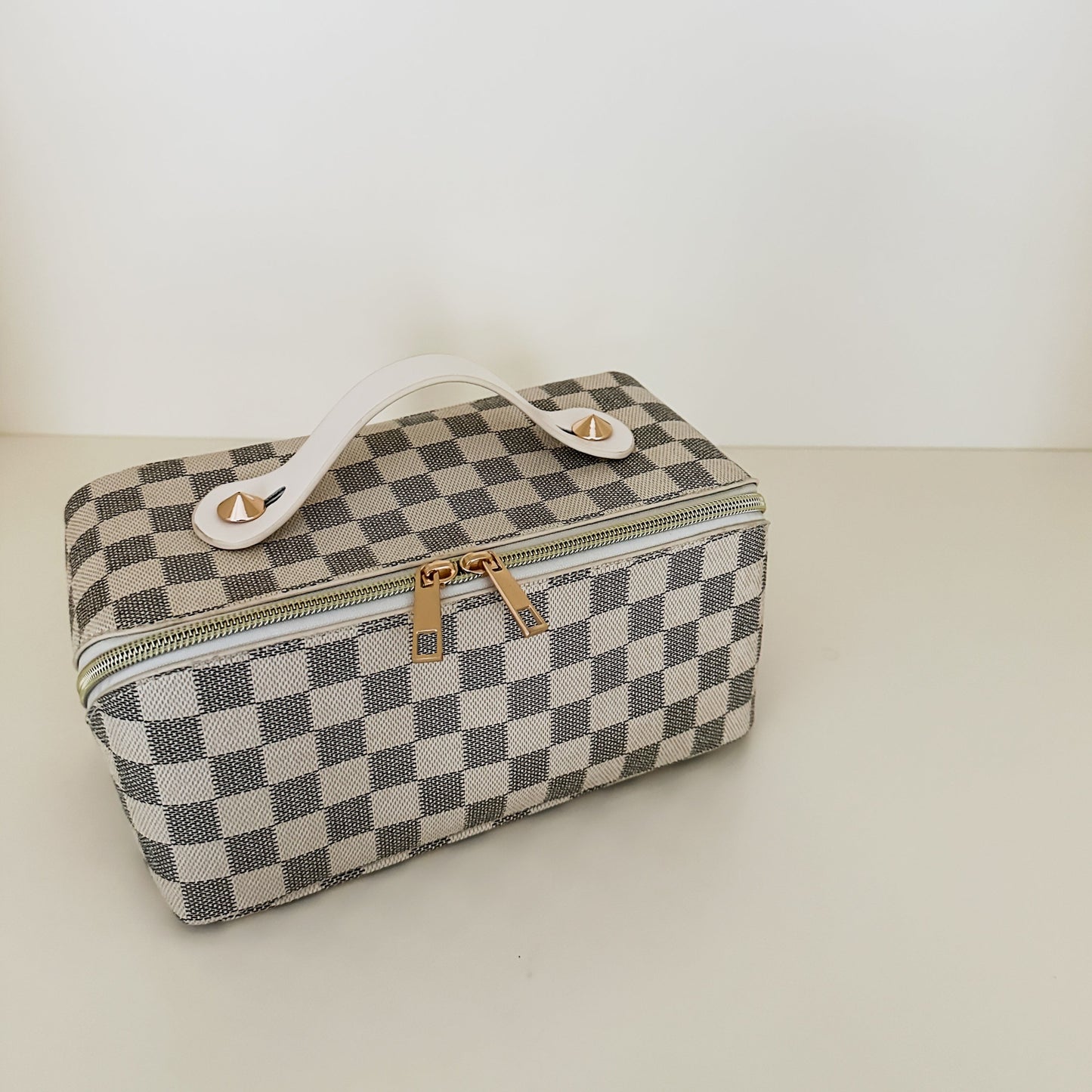 White checkered toiletry case front view