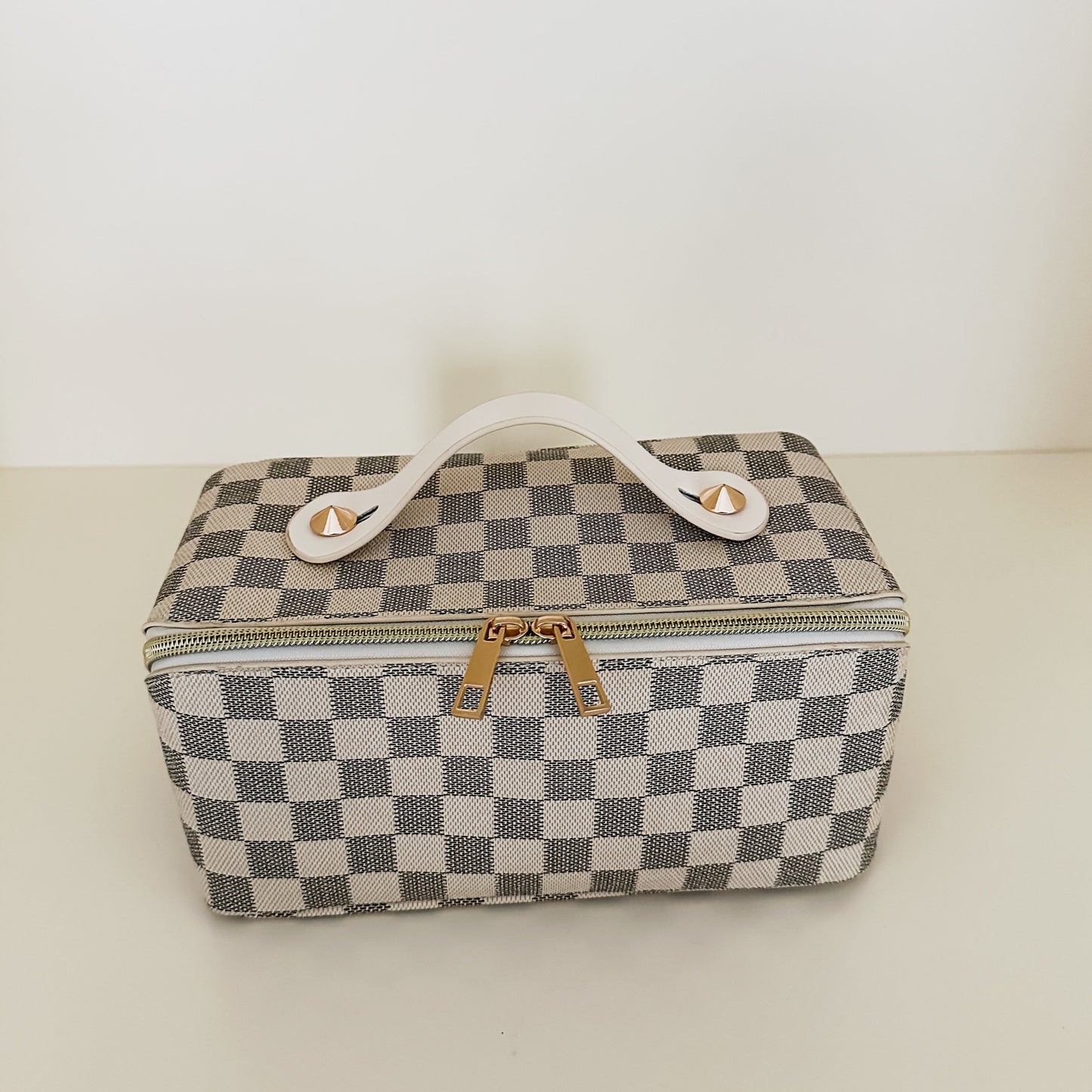 White checkered toiletry case front view