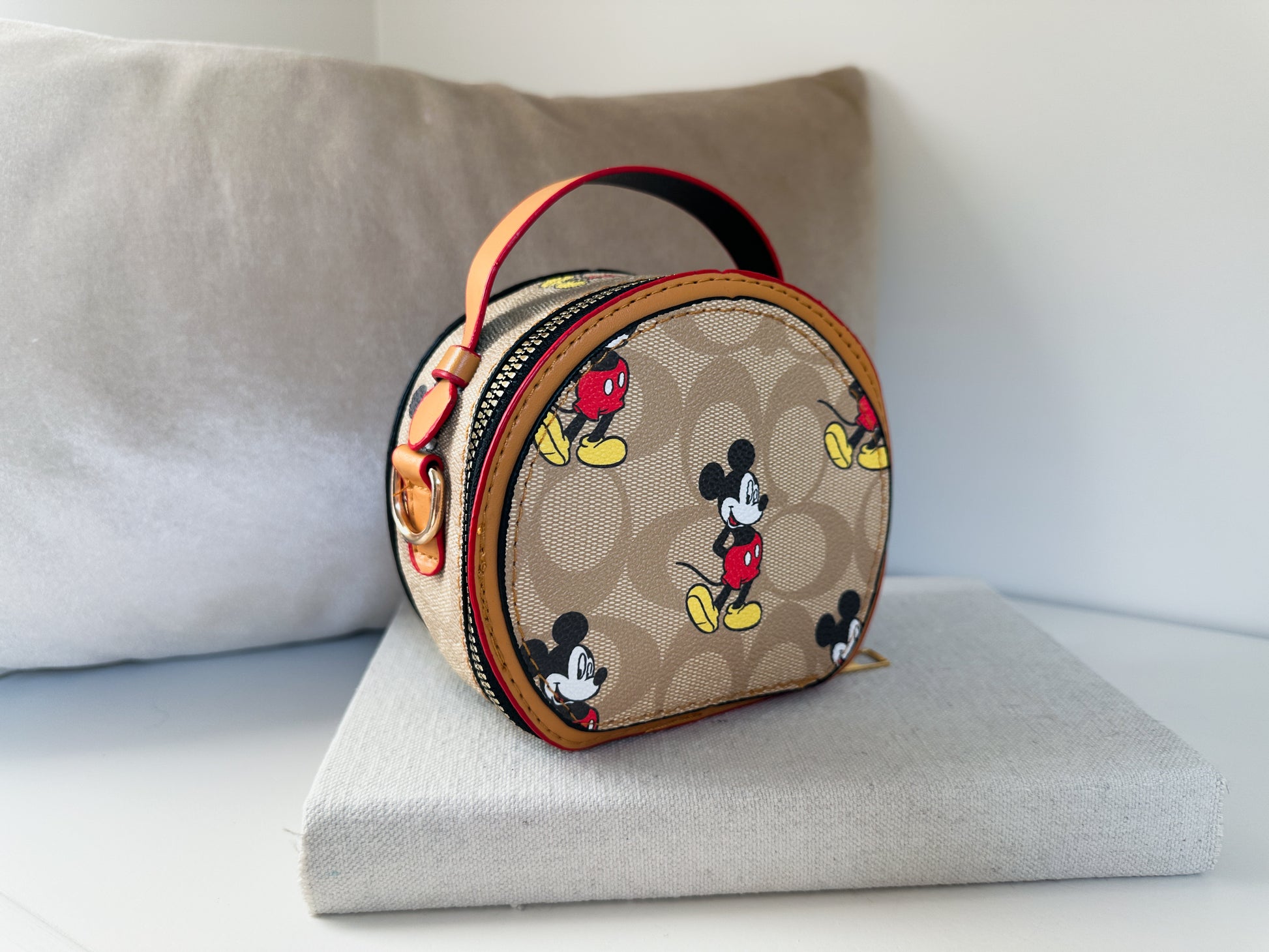 Round mini zippered purse with C print and cartoon graphic | the epcot by little luxe