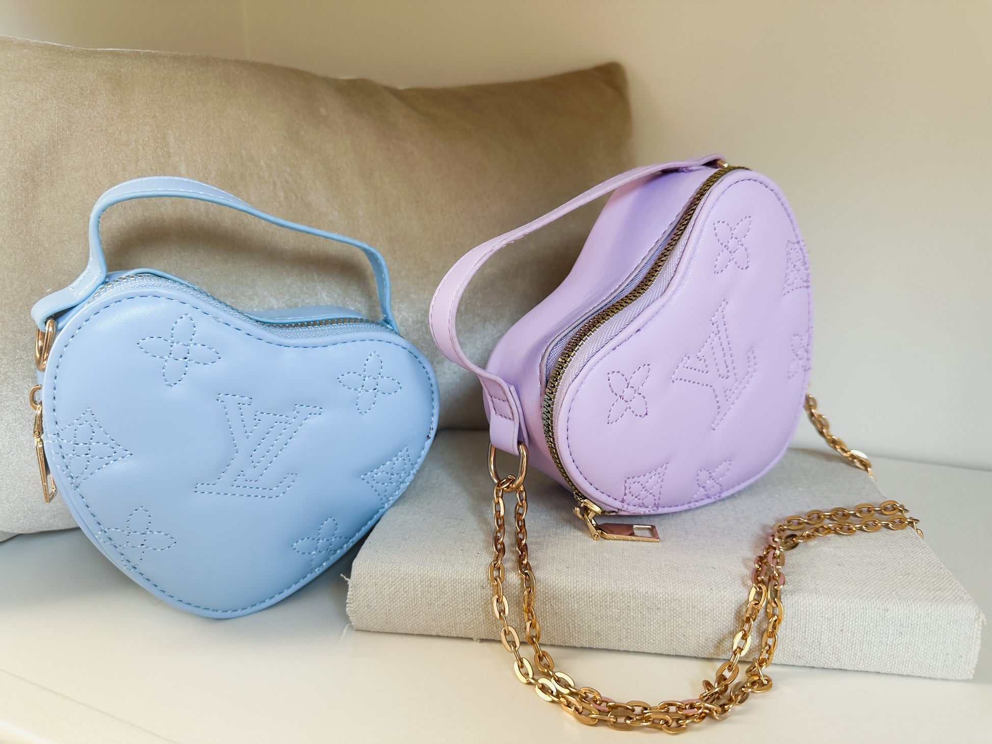 Modern luxury heart shaped mini handbag zippered opening | the tokyo by little luxe